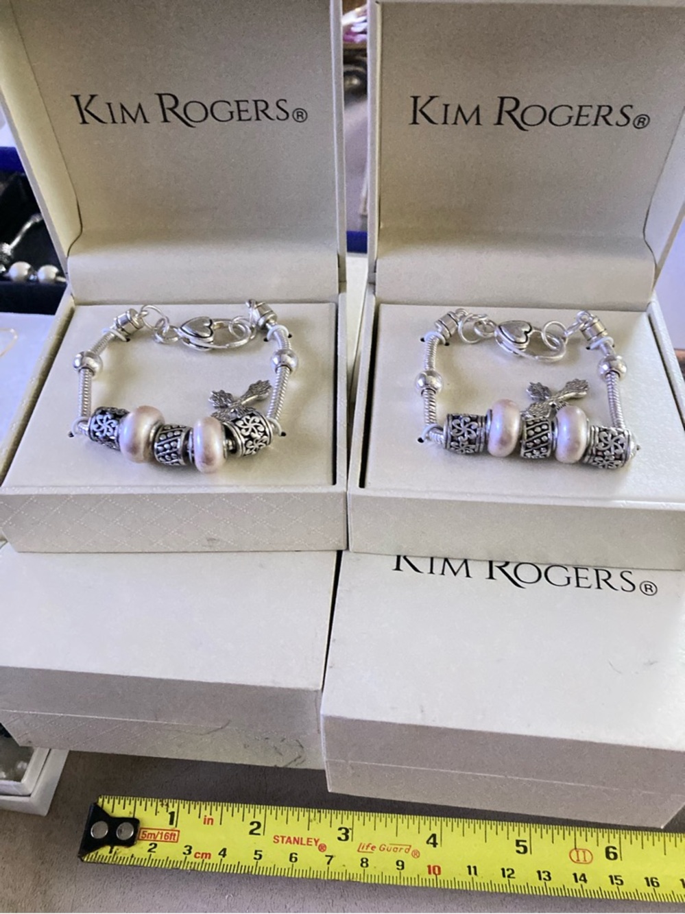 Lot Of 7 Of The Same Charm Bracelets,w/cross see pictures for exact details